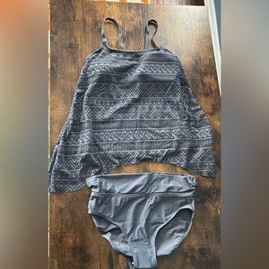 NWOT, shipped in bag w/label. Gray tankini size Small. Ordered XL shipped small